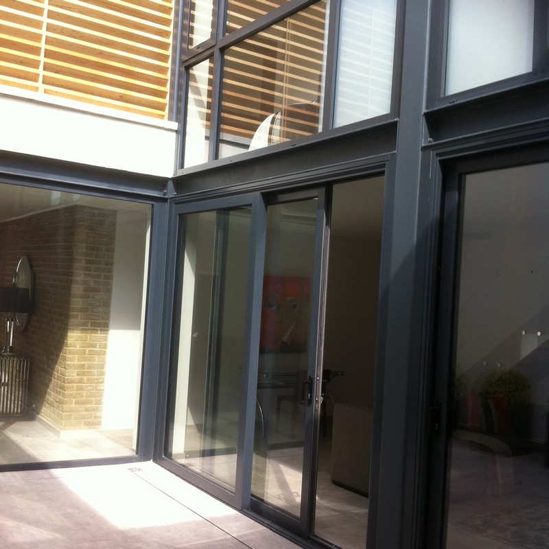 Anthracite aluminium sliding patio doors fitted in Lee