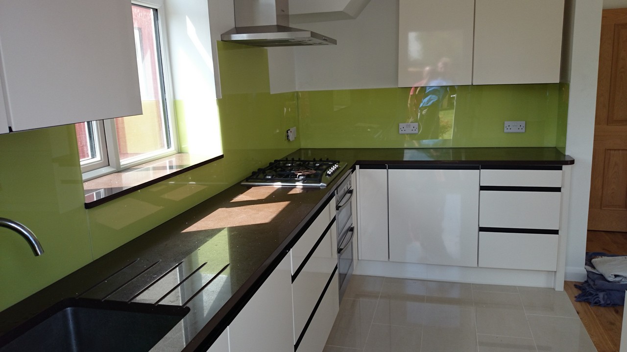 Lime green glass kitchen splashback installed by Lee glaziers