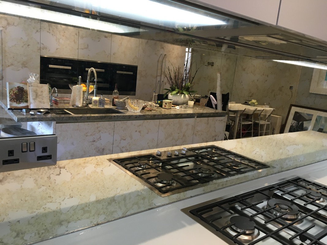 Mirror glass splashback in Lee luxury kitchen
